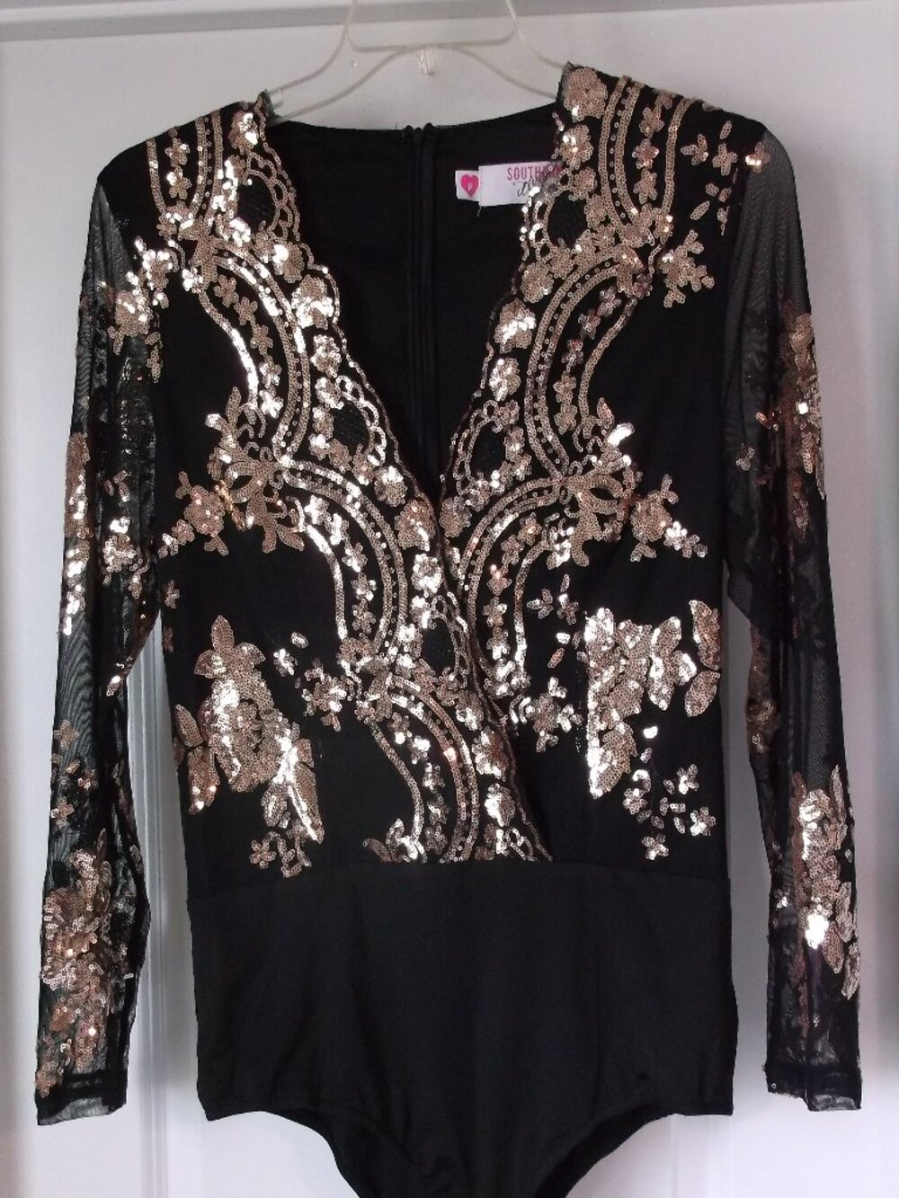 long sleeve black and rose gold sequin bodysuit